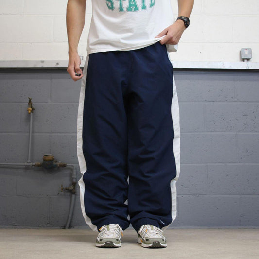Baggy Nike Trackies XL Navy y2k 00s style loose wide leg joggers embroidered swoosh logo mesh lining