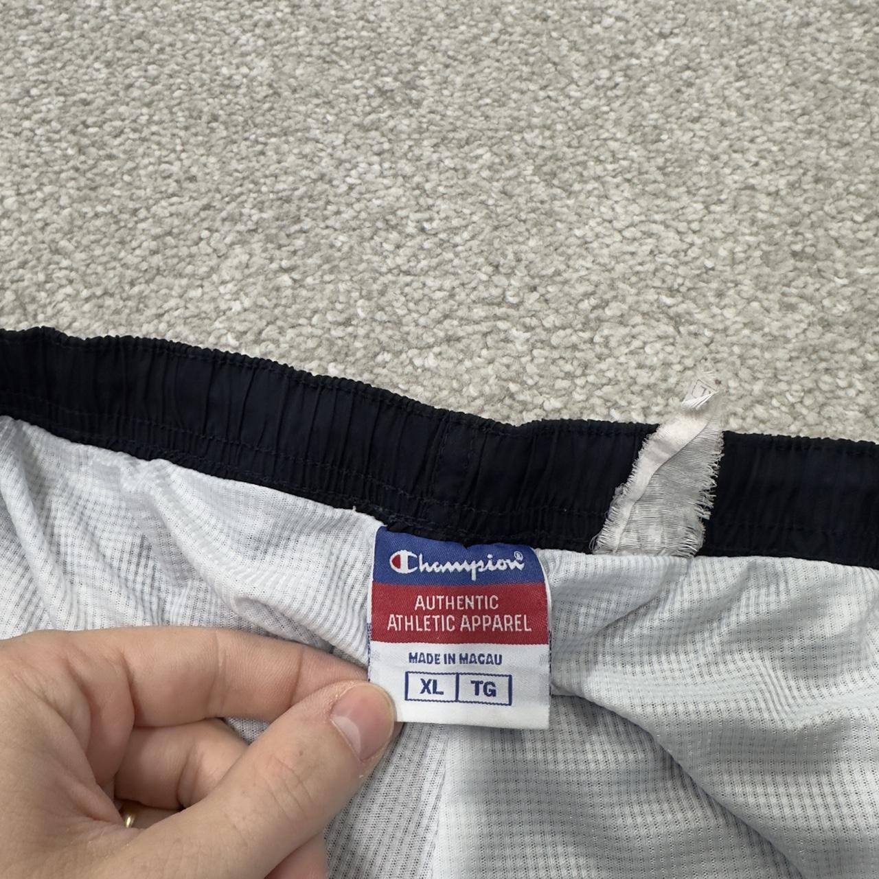 Baggy Y2K Champion tracksuit bottoms navy Loose leg lined 2000s style casual track pants