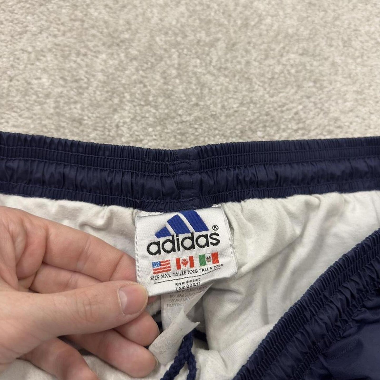 Vintage Y2K baggy Adidas tracksuit bottoms navy Loose-leg embroidered lined side stripe track pants