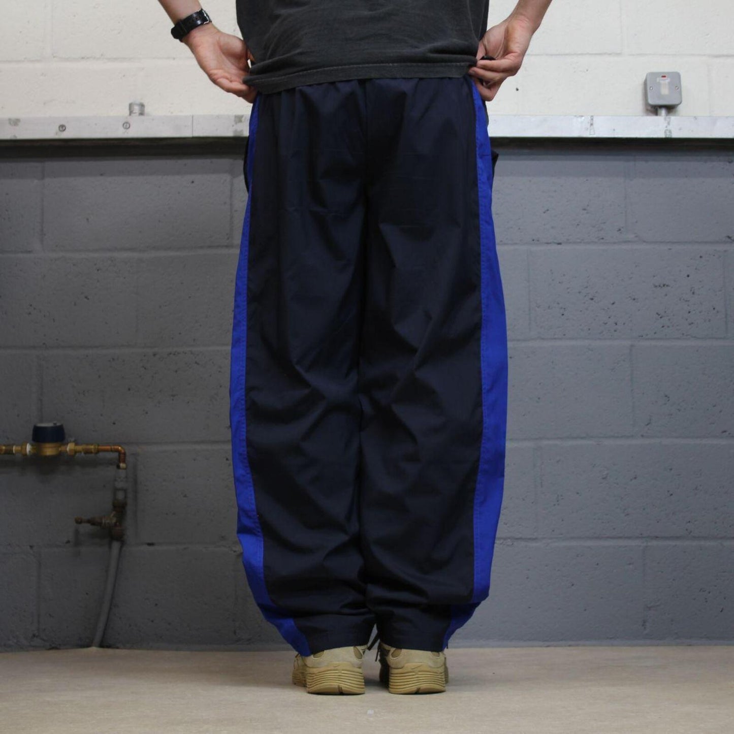 Y2K FILA tracksuit bottoms navy Loose embroidered lined side stripe track pants