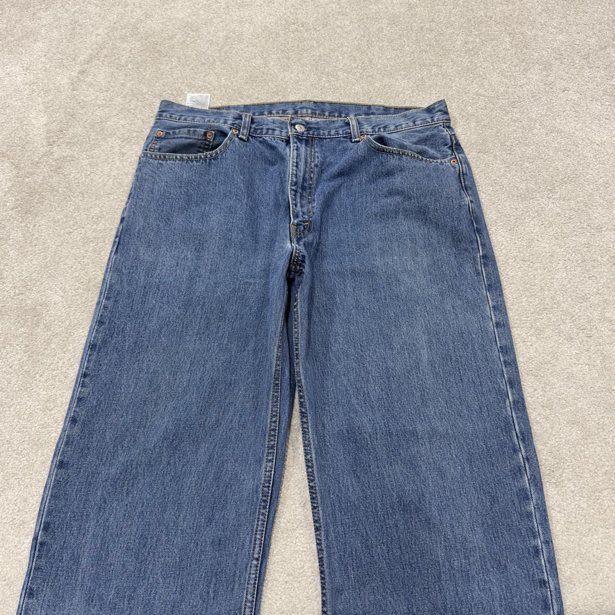 Levi’s 550 jeans Y2K blue denim loose leg 2000s style pants red tab logo