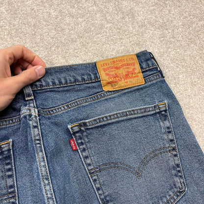 Vintage y2k Levi's 505 jeans blue Straight leg denim casual pants red tab logo