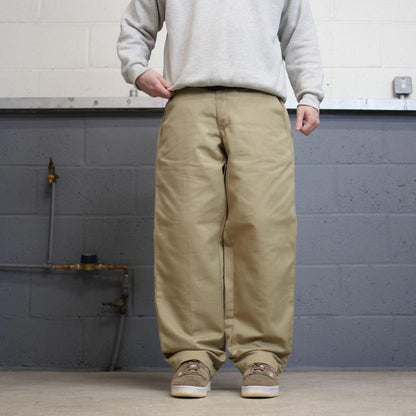 Vintage y2k baggy work pants beige Loose chino style skate trousers Red Kap workwear patch logo