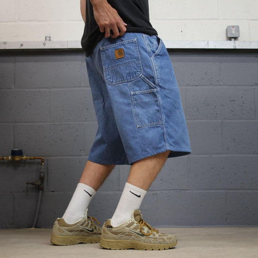 Vintage Carhartt baggy denim shorts faded blue Loose cargo skater style workwear carpenter jorts