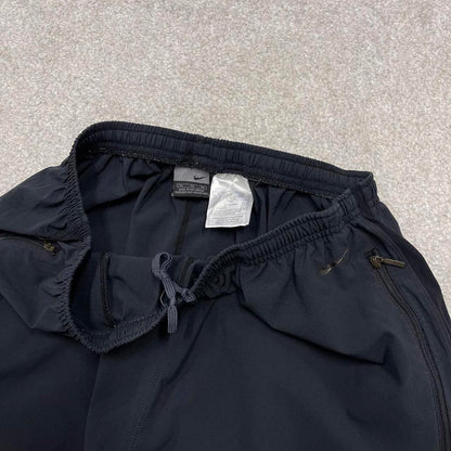 Black Nike trackies XL loose y2k style joggers print Swoosh logo track pants side stripes