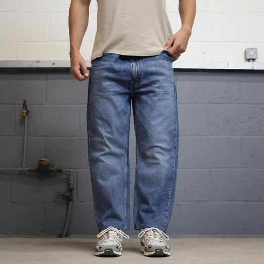Blue Levis 505 jeans W40L26 blue straight leg y2k style pants red tab logo