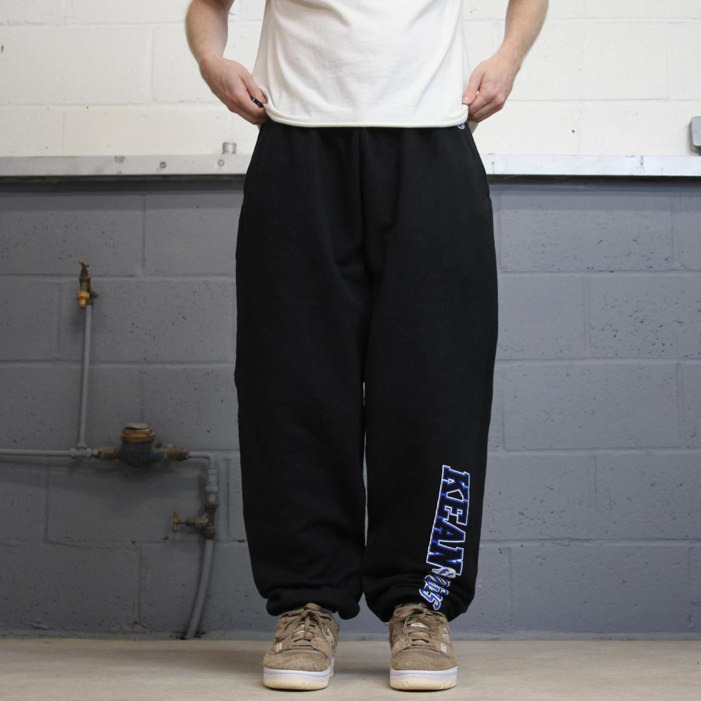 Baggy Champion tracksuit bottoms joggers M y2k black track pants embroidered casual gym wear sporty