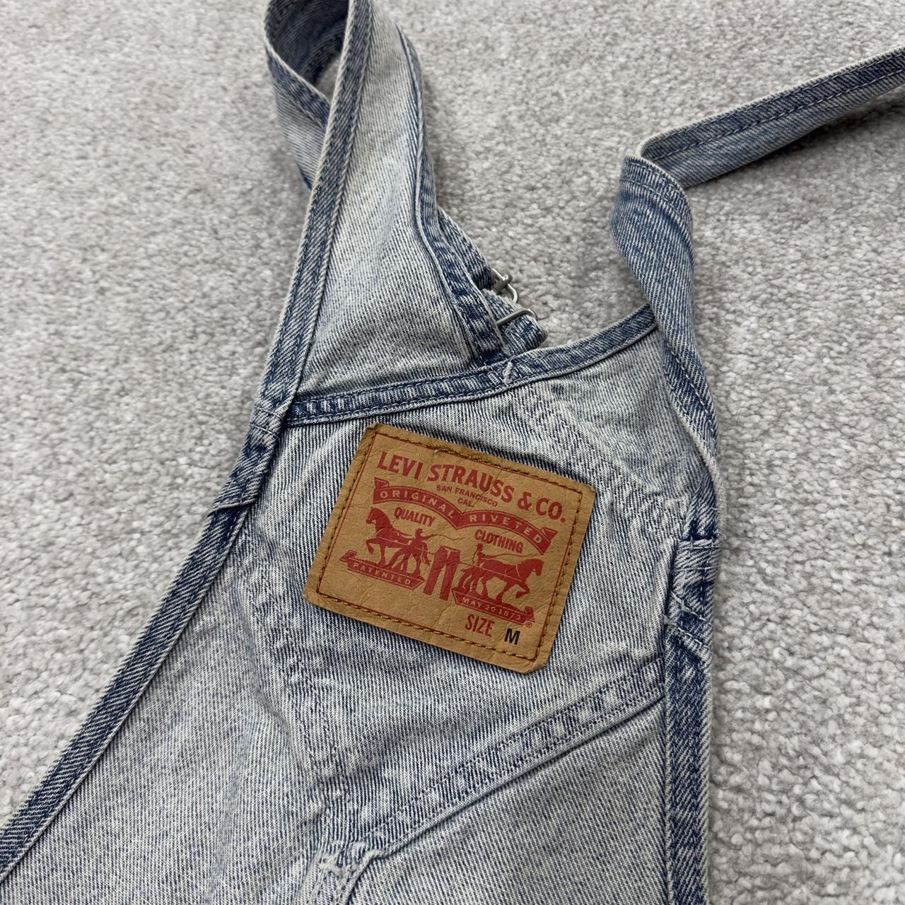 Vintage Levi’s red tab logo dungarees 00s denim overalls blue