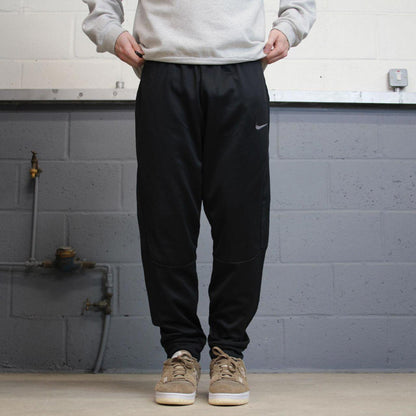 Nike Trackies Large Black y2k 00s style loose sportswear joggers embroidered Swoosh logo