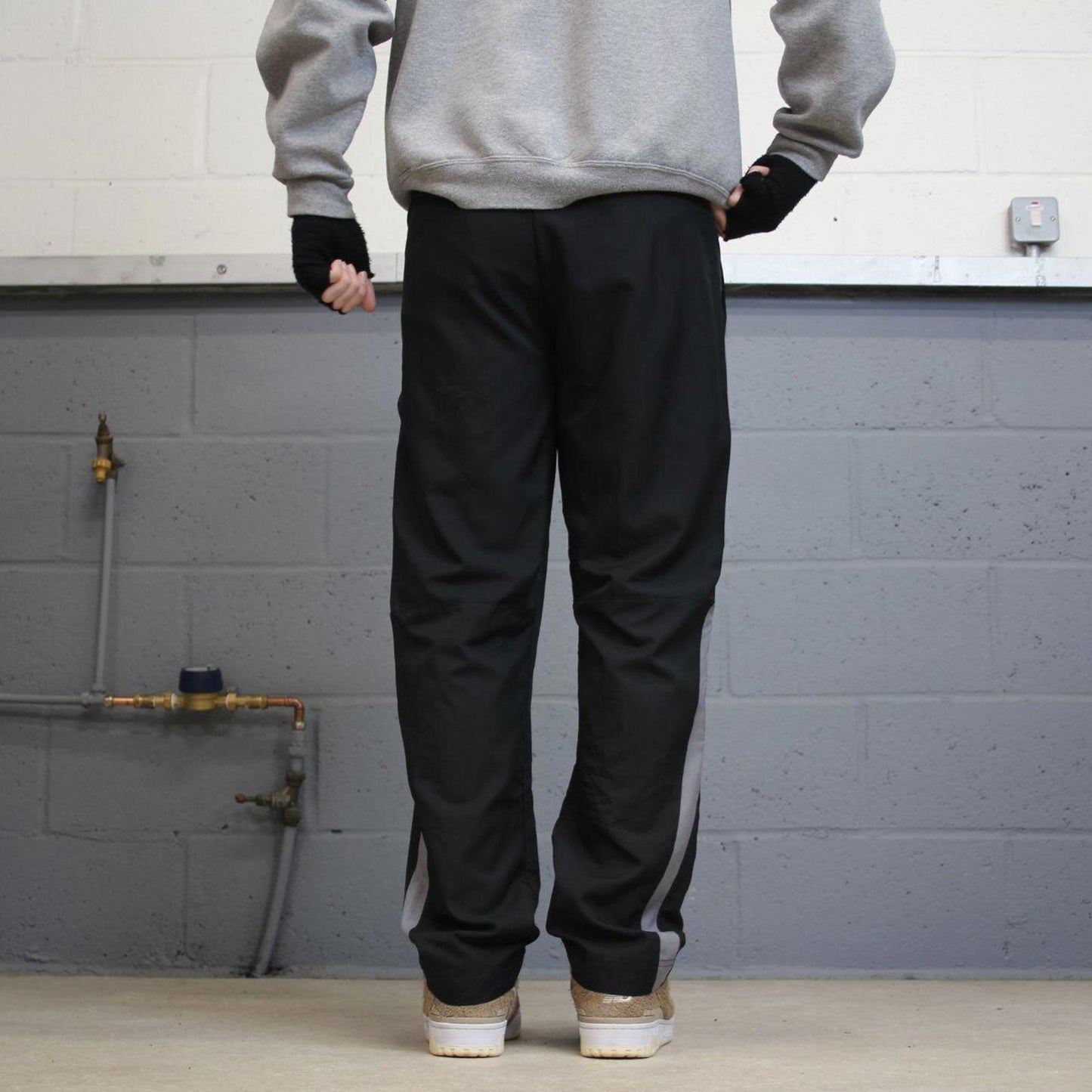 00s Nike tracksuit bottoms y2k S loose black joggers print Swoosh logo gym wear trackies