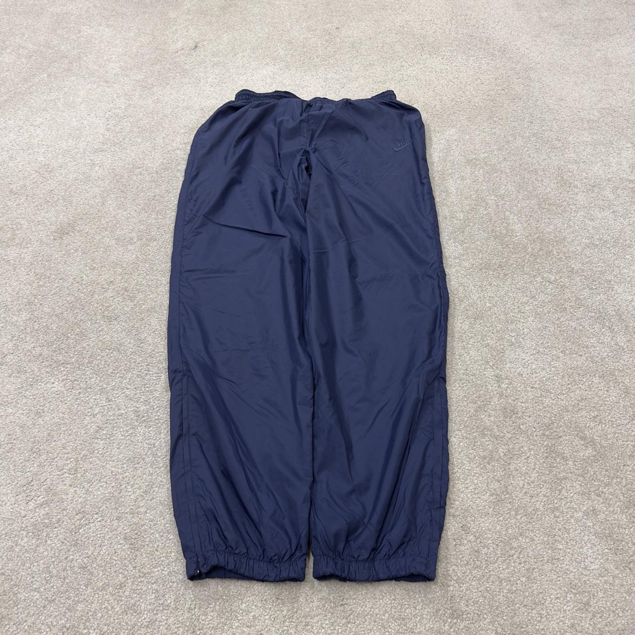 Y2K vintage Nike baggy tracksuit bottoms navy Loose leg 2000s style casual swoosh logo track pants