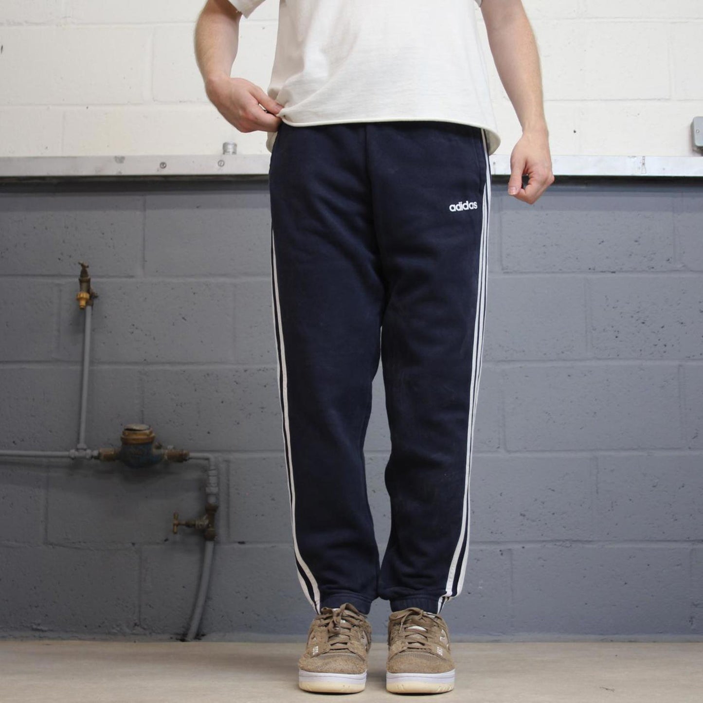 Vintage navy Adidas joggers M y2k style sportswear track pants side stripe design