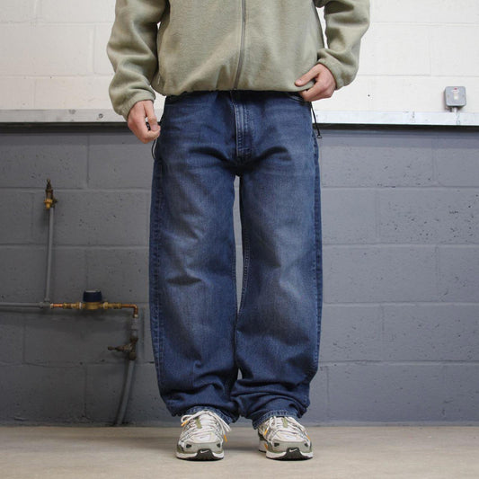 Y2K baggy Levi’s 550 jeans wide leg blue Loose fit denim pants red tab logo