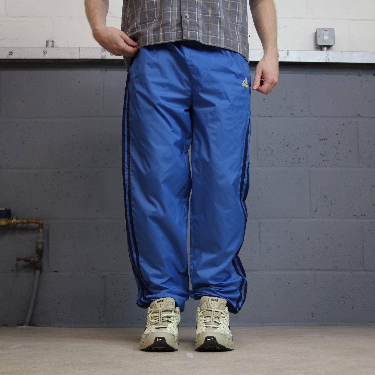 Vintage y2k Adidas tracksuit bottoms blue Loose leg embroidered side stripe 2000s style track pants