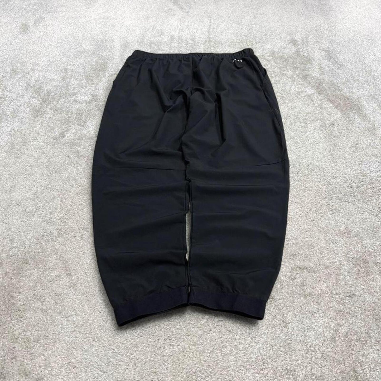 Nike tracksuit bottoms loose fit black Lightweight floaty swoosh logo track pants