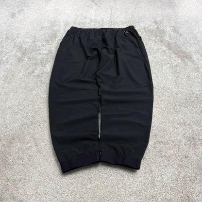 Nike tracksuit bottoms loose fit black Lightweight floaty swoosh logo track pants