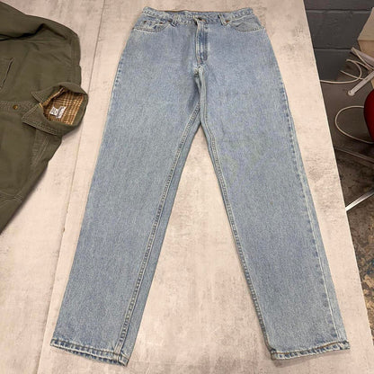 Blue Levi's 550 jeans size 12 (W30L33) relaxed fit taper leg denim jeans