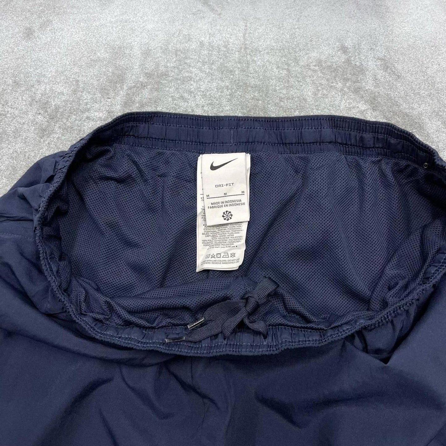 Vintage y2k Nike tracksuit bottoms navy Wide leg embroidered track pants cuffed ankles