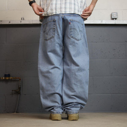 Levi’s 550 baggy jeans y2k W36L34 blue relaxed fit surf style pants red tab logo