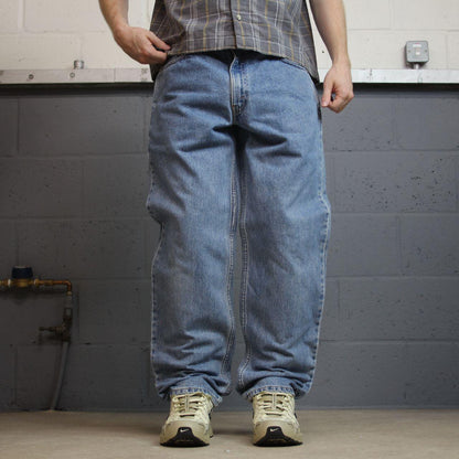 Levi’s 550 relaxed jeans y2k W34L32 blue straight leg denim red tab logo pants