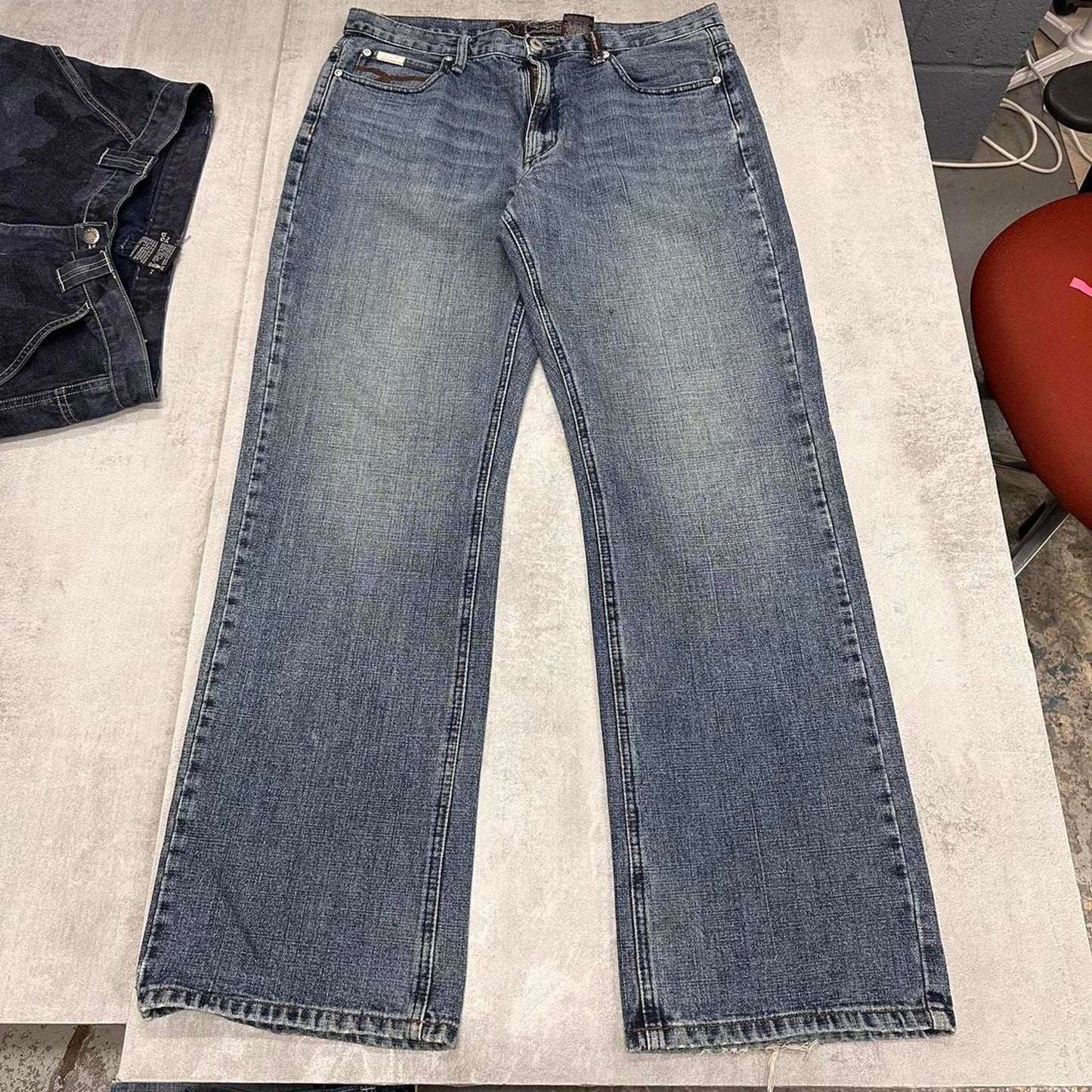 Blue Exhaust jeans W34L32 embroidered Y2K style stitch detailing design