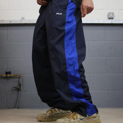 Y2K FILA tracksuit bottoms navy Loose embroidered lined side stripe track pants