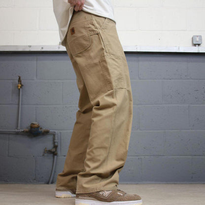 Vintage baggy Carhartt carpenter pants W32L30 tan 90s style loose leg skater cargos