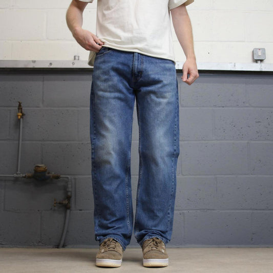 Blue Levis 505 jeans W34L32 blue straight leg y2k style pants red tab logo