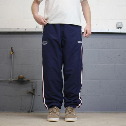 Navy Adidas trackies L y2k style sportswear track pants embroidered logo side stripe design