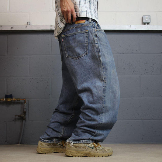 Vintage Levi’s baggy jeans 560 Y2K blue Loose fit 100% cotton denim pants red tab logo