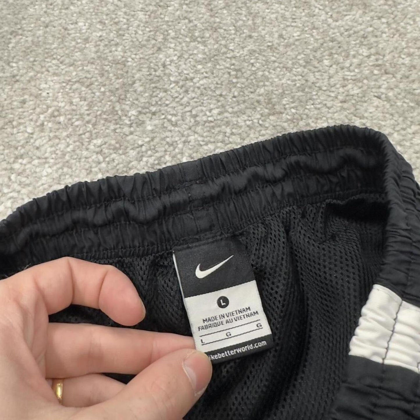 Nike tracksuit bottoms Y2K black Loose fit mesh lined embroidered side stripe track pants