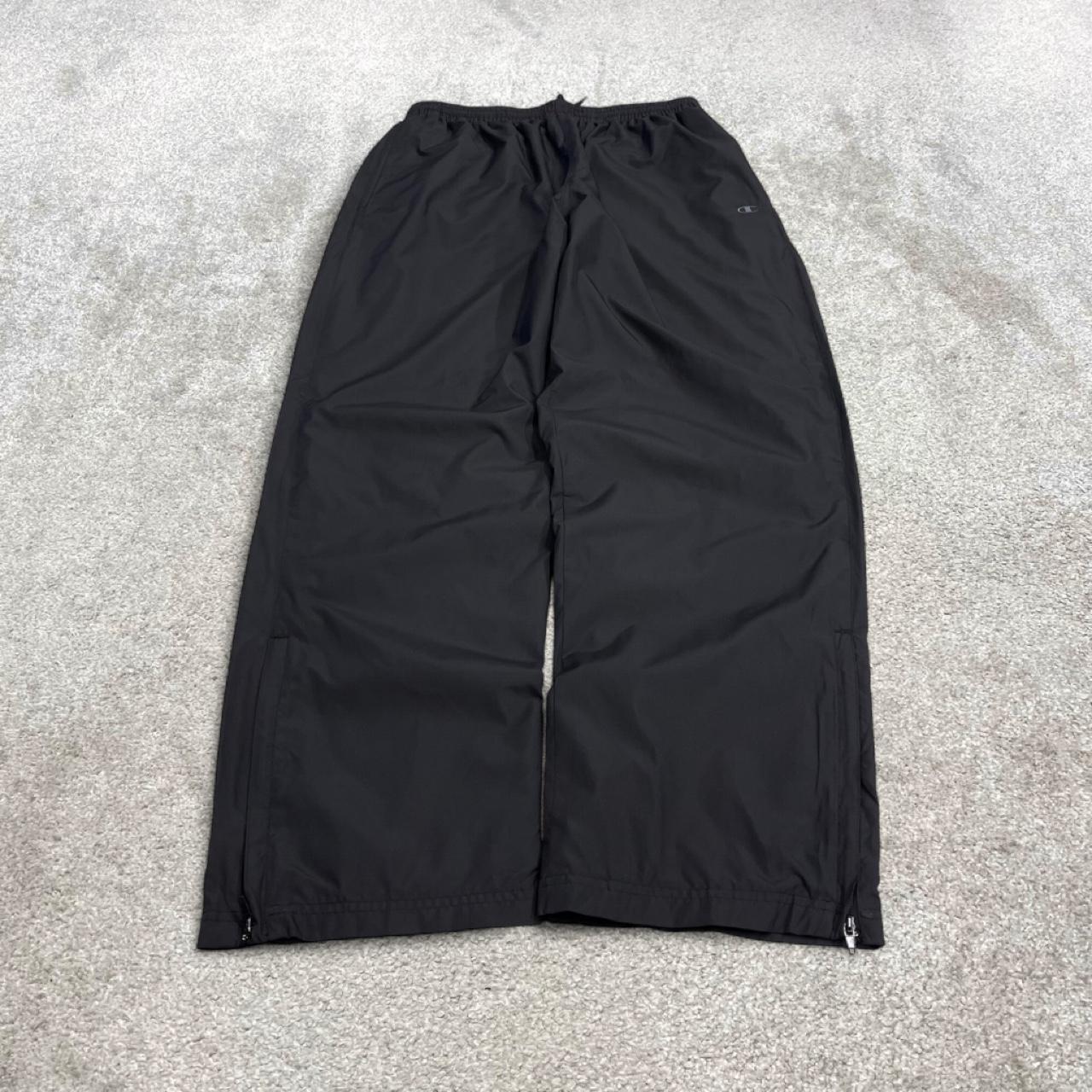 Champion baggy tracksuit bottoms wide leg black Mesh lined embroidered logo gym wear track pants