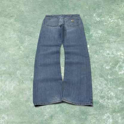 Carhartt work jeans relaxed fit blue Denim workwear pants white patch logo