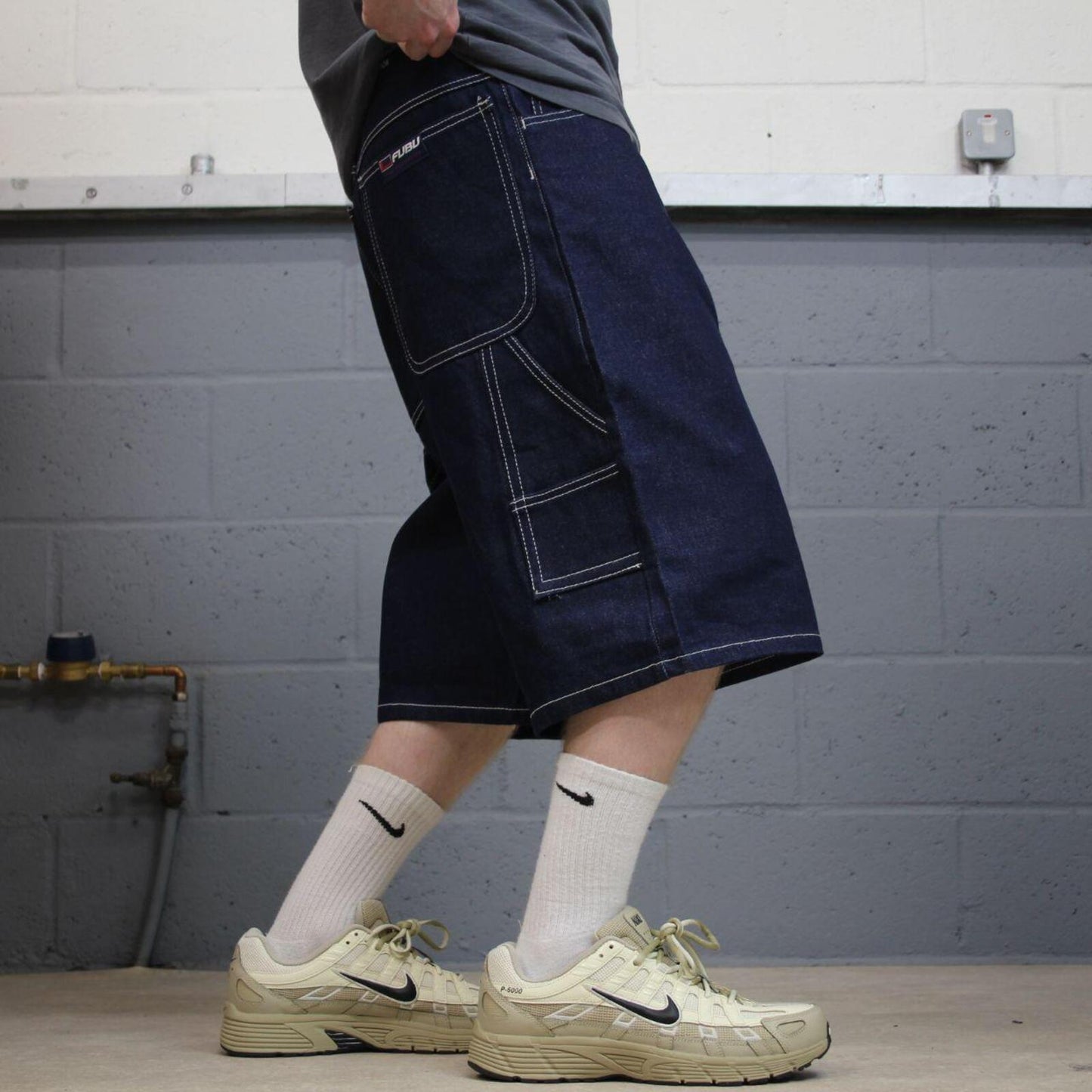 Baggy denim carpenter shorts y2k navy blue Thick denim cargo festival shorts with FUBU details