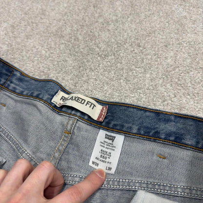Vintage Y2K Levi’s 550 jeans blue W38L30 Loose straight leg 00s style denim pants red tab logo