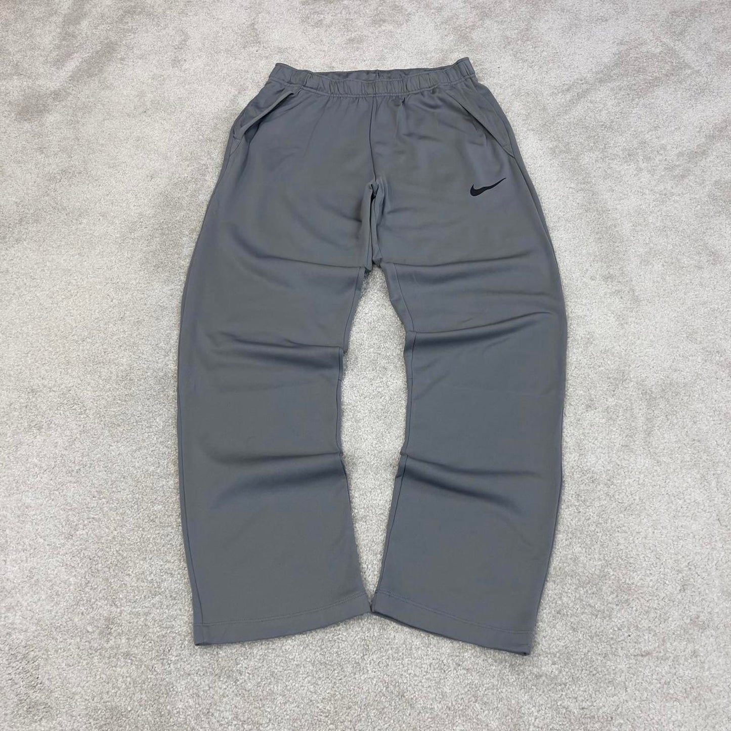Nike Trackies Large Grey y2k 00s style loose leg Dri-Fit joggers print Swoosh logo