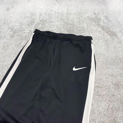 Vintage y2k Nike tracksuit bottoms black Lightweight swoosh logo running track pants