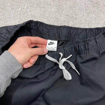 00s Nike tracksuit bottoms y2k XXL loose black joggers embroidered Swoosh logo gym wear trackies