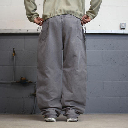 Vintage baggy Carhartt jeans 90s y2k skater style W46L30 grey relaxed fit 100% cotton canvas