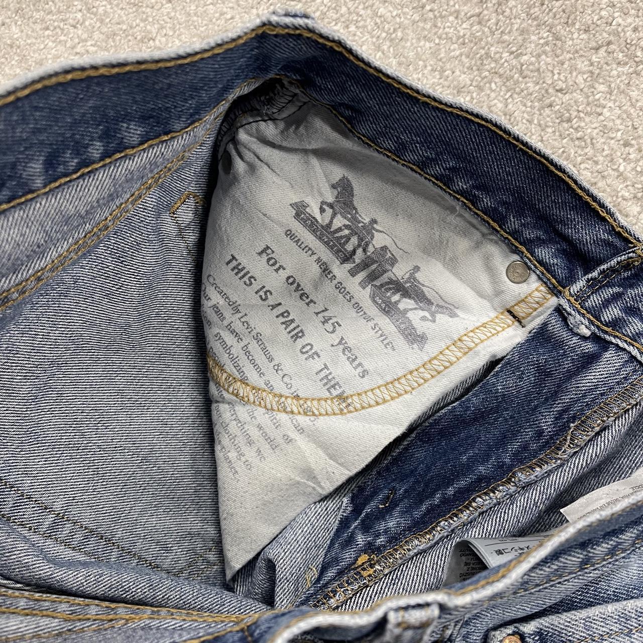 Y2K Levi’s 505 jeans straight leg washed blue Straight fit 5 pocket pants belt loops red tab logo