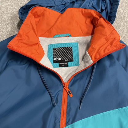 Oakley technical windbreaker jacket colour block paneled blue orange pull over half zip y2k