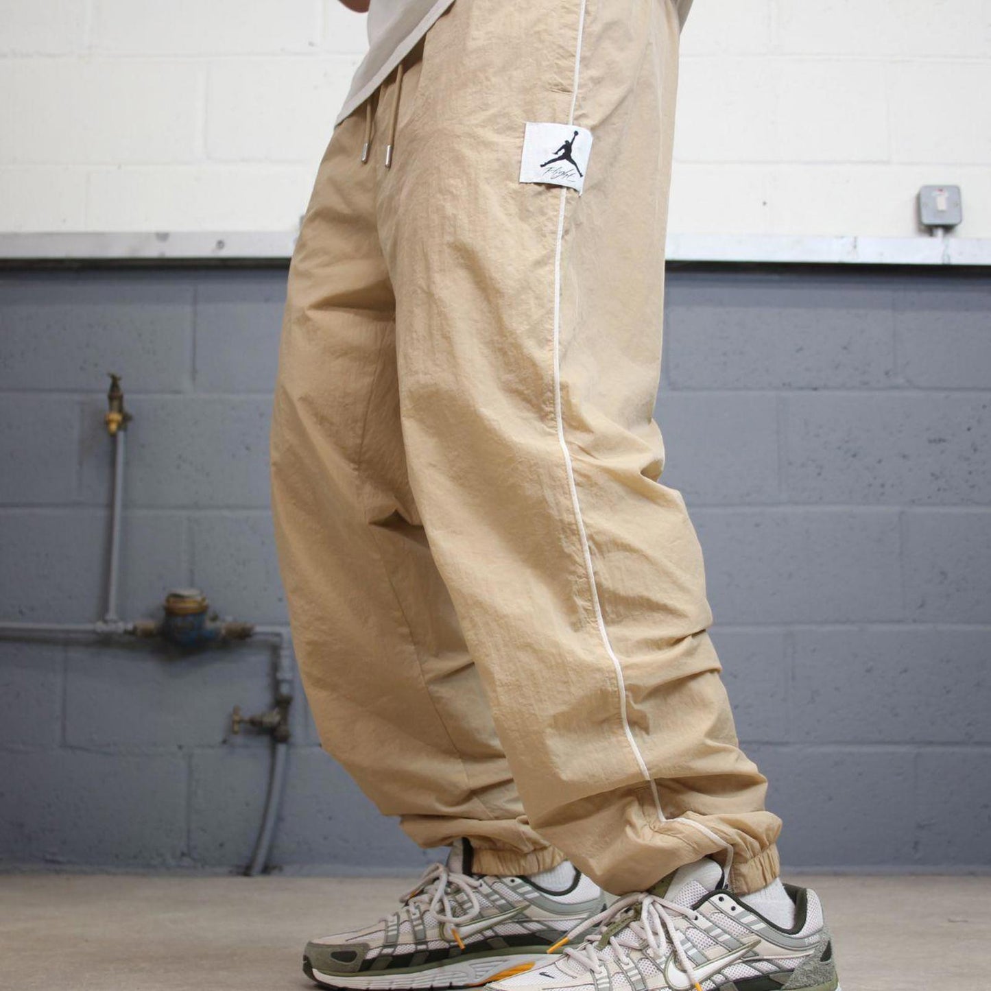 Air Jordan Trackies Large beige mesh lined loose sportswear floaty leg joggers