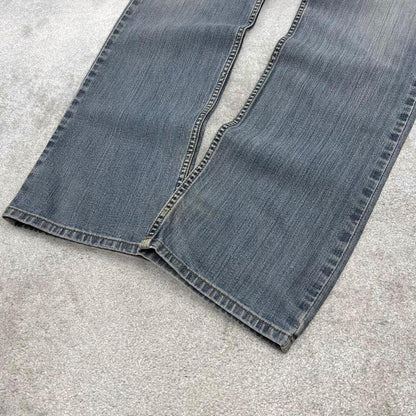 Carhartt work jeans relaxed fit blue Denim workwear pants white patch logo