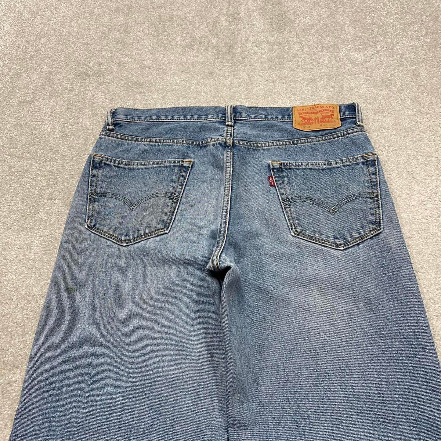 Y2K baggy Levi’s 550 jeans wide leg blue Loose fit denim pants red tab logo