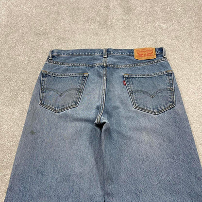 Y2K baggy Levi’s 550 jeans wide leg blue Loose fit denim pants red tab logo