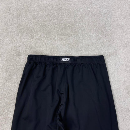 Baggy Nike Trackies Large Black y2k 00s style loose wide leg joggers embroidered logo side stripe