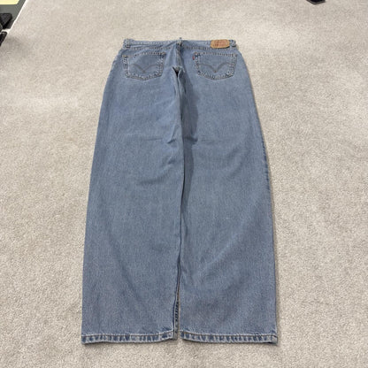 Levi’s baggy jeans y2k W36L34 blue 560 comfort fit surf style pants red tab logo