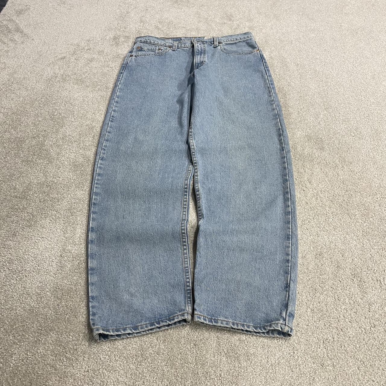 Vintage Levi’s baggy jeans y2k W34L32 washed blue Levi’s 550 relaxed fit surf style pants red tab