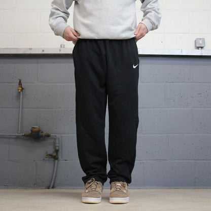 Nike Trackies L black y2k 00s style dri-fit joggers embroidered logo