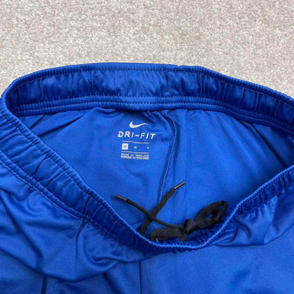 Vintage y2k Nike tracksuit bottoms blue Floaty swoosh logo running track pants
